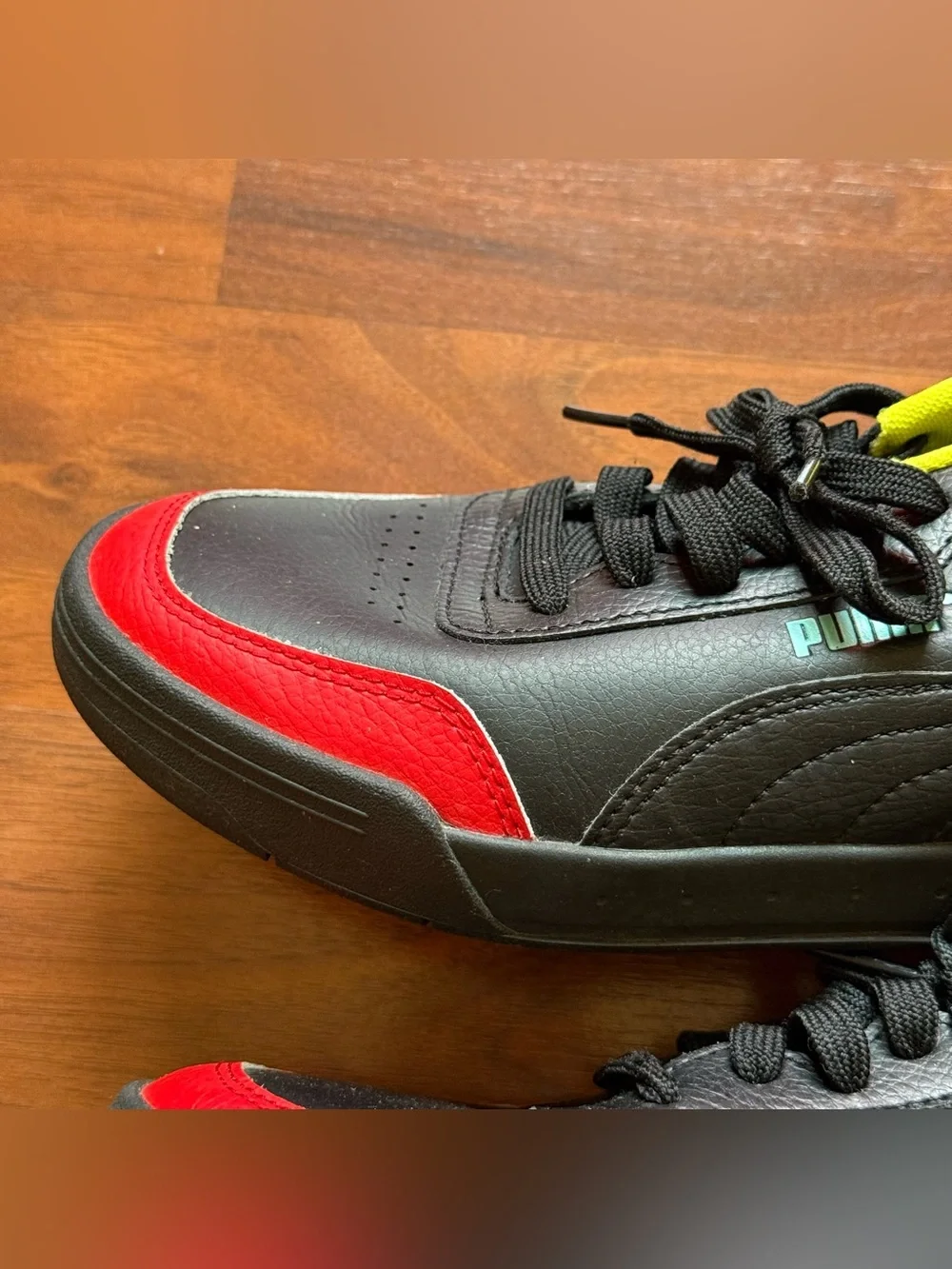 Puma Caracal sneakers men's size 7.5 women's size 9 black high-risk red nrgy